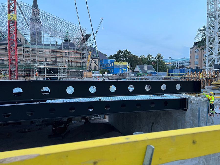 Perforated steel beams installed over the excavation, Atlas Pavilion